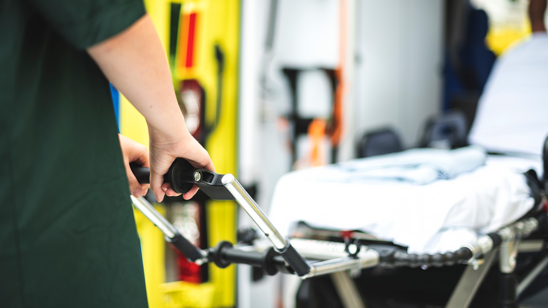 Paramedics at work with an ambulance